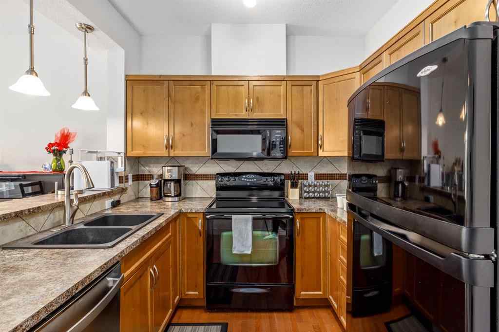 MLS® A2268462 - Unit #7 156 Rockyledge View NW in Rocky Ridge Calgary, Residential