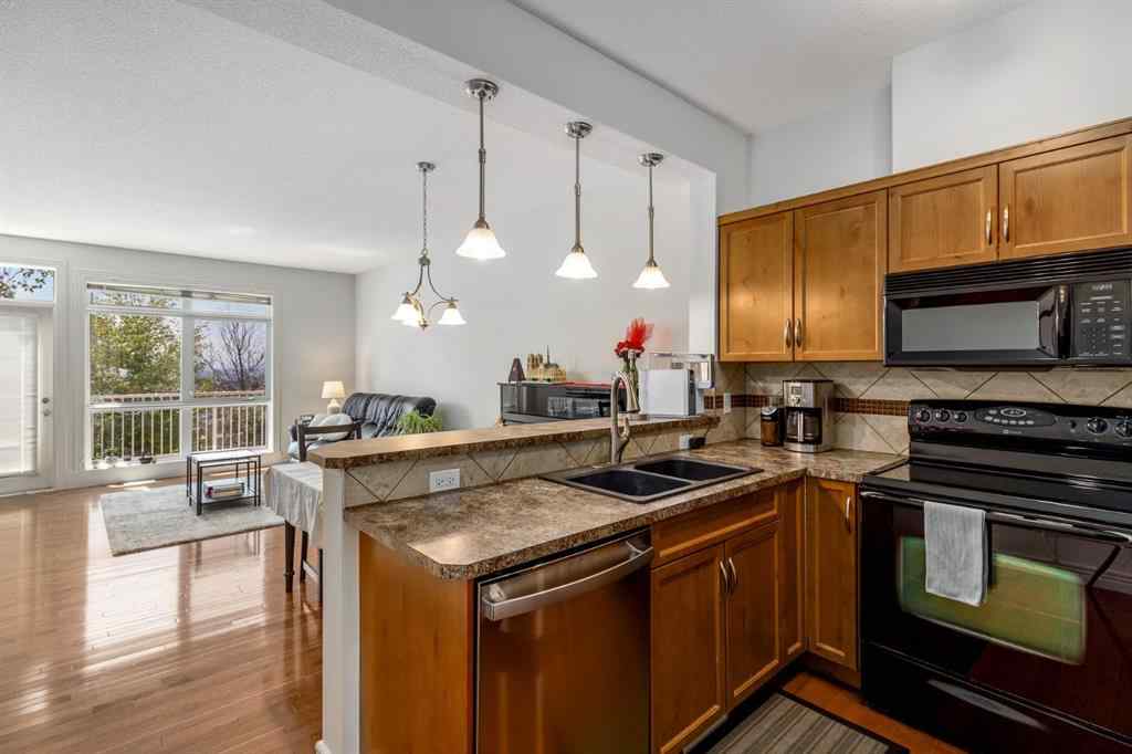 MLS® A2268462 - Unit #7 156 Rockyledge View NW in Rocky Ridge Calgary, Residential
