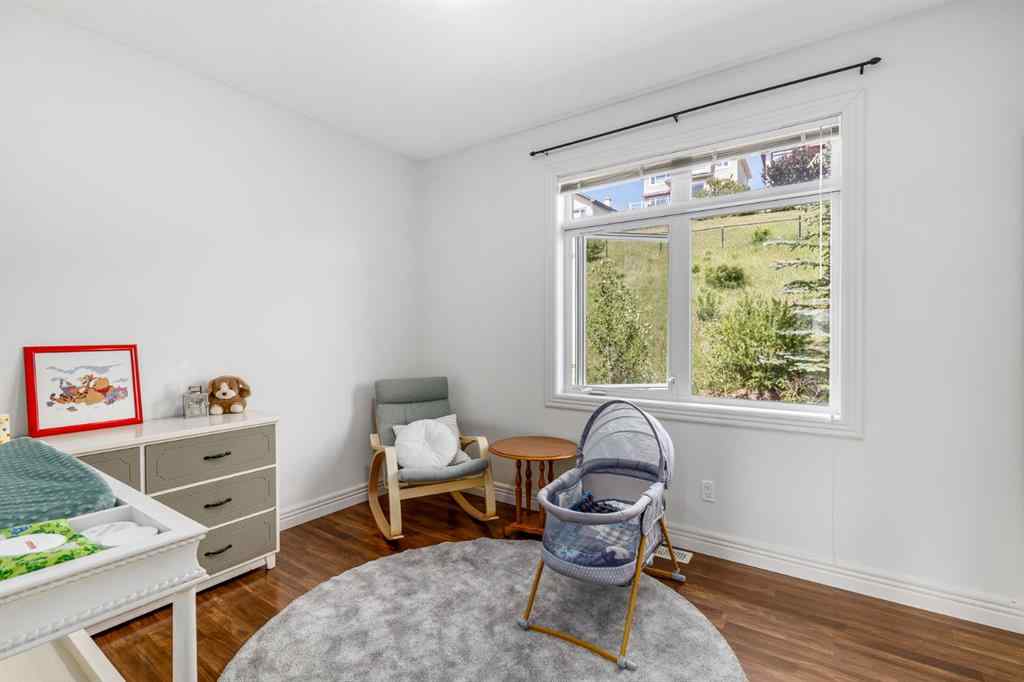 MLS® A2268462 - Unit #7 156 Rockyledge View NW in Rocky Ridge Calgary, Residential