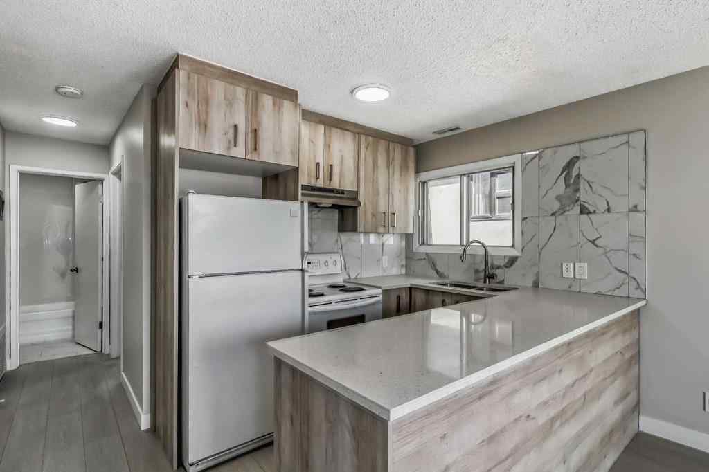 MLS® A2268473 - Unit #A,B,C,D,E 1917 24 Street SW in Richmond Calgary, Multi-Family