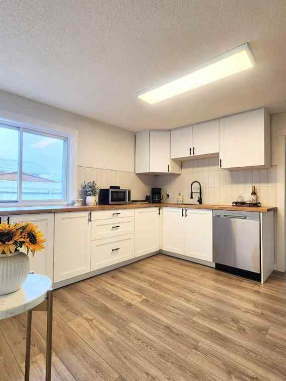 MLS® A2268474 - 406 8 Avenue SE in Southeast Central High River High River, Residential