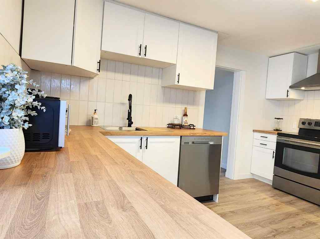 MLS® A2268474 - 406 8 Avenue SE in Southeast Central High River High River, Residential