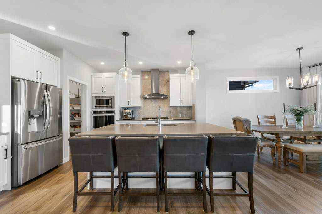 MLS® A2268480 - 24 Highwood Drive  in Wedderburn Okotoks, Residential