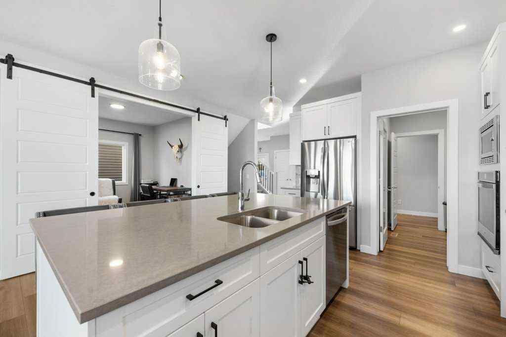 MLS® A2268480 - 24 Highwood Drive  in Wedderburn Okotoks, Residential