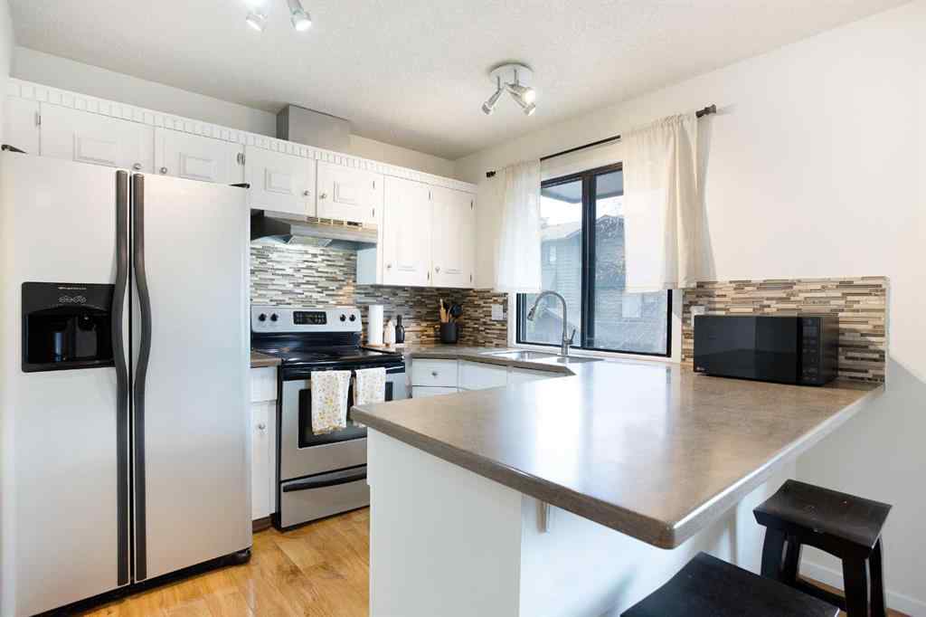 MLS&reg; # A2268494 - Unit #54 10030 Oakmoor Way SW in Oakridge Calgary, Residential Open Houses