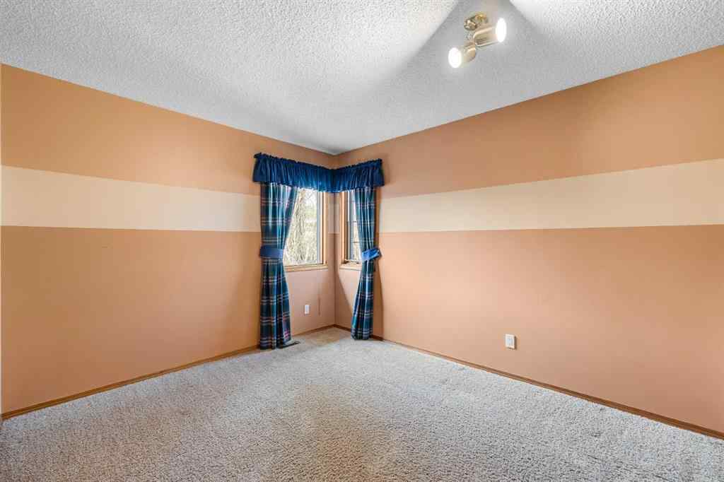 MLS® A2268510 - 201 Signature Way SW in Signal Hill Calgary, Residential