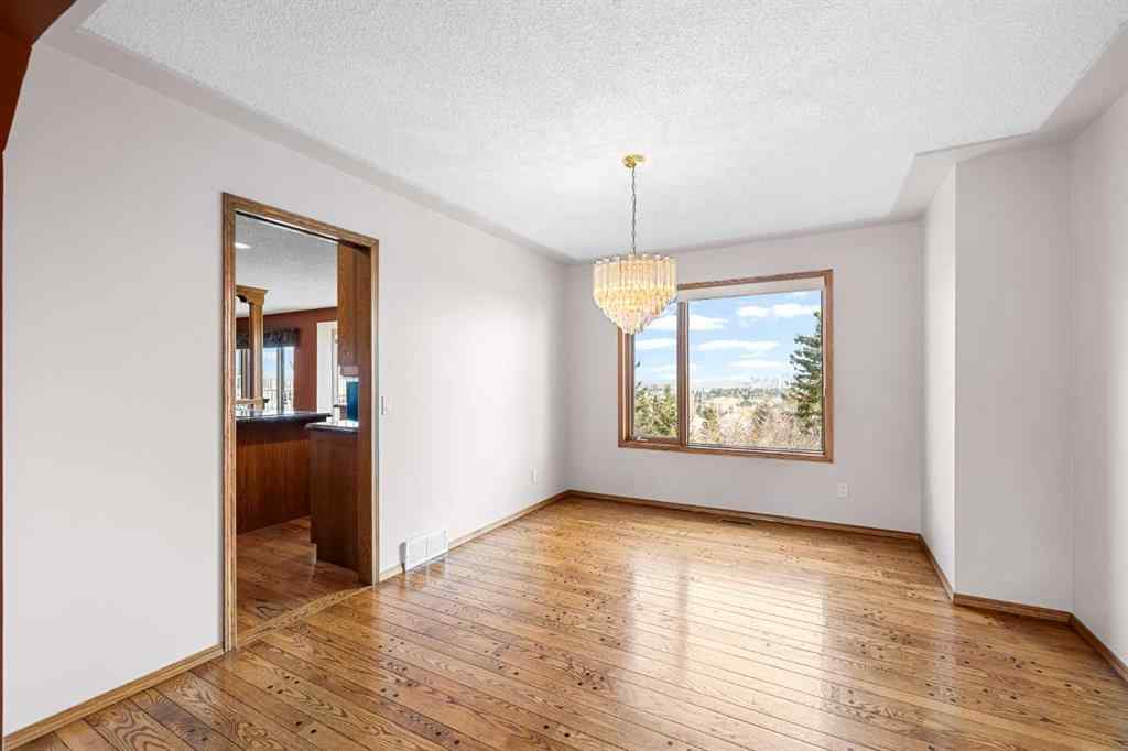 MLS® A2268510 - 201 Signature Way SW in Signal Hill Calgary, Residential