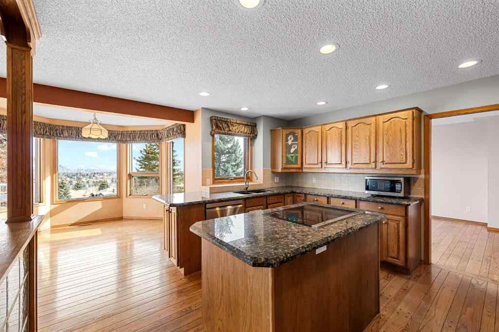 MLS® A2268510 - 201 Signature Way SW in Signal Hill Calgary, Residential