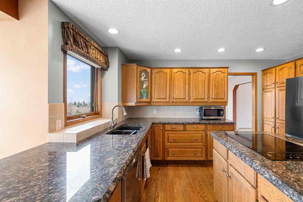 MLS® A2268510 - 201 Signature Way SW in Signal Hill Calgary, Residential