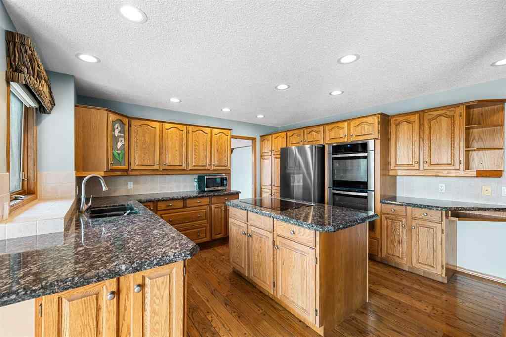 MLS® A2268510 - 201 Signature Way SW in Signal Hill Calgary, Residential