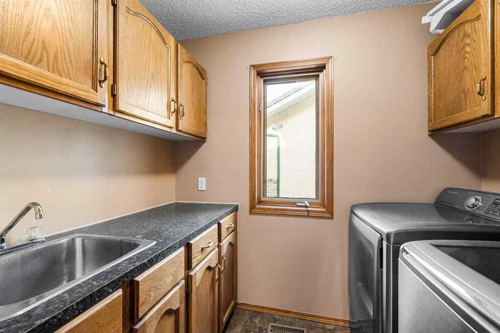 MLS® A2268510 - 201 Signature Way SW in Signal Hill Calgary, Residential