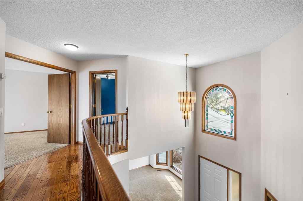 MLS® A2268510 - 201 Signature Way SW in Signal Hill Calgary, Residential