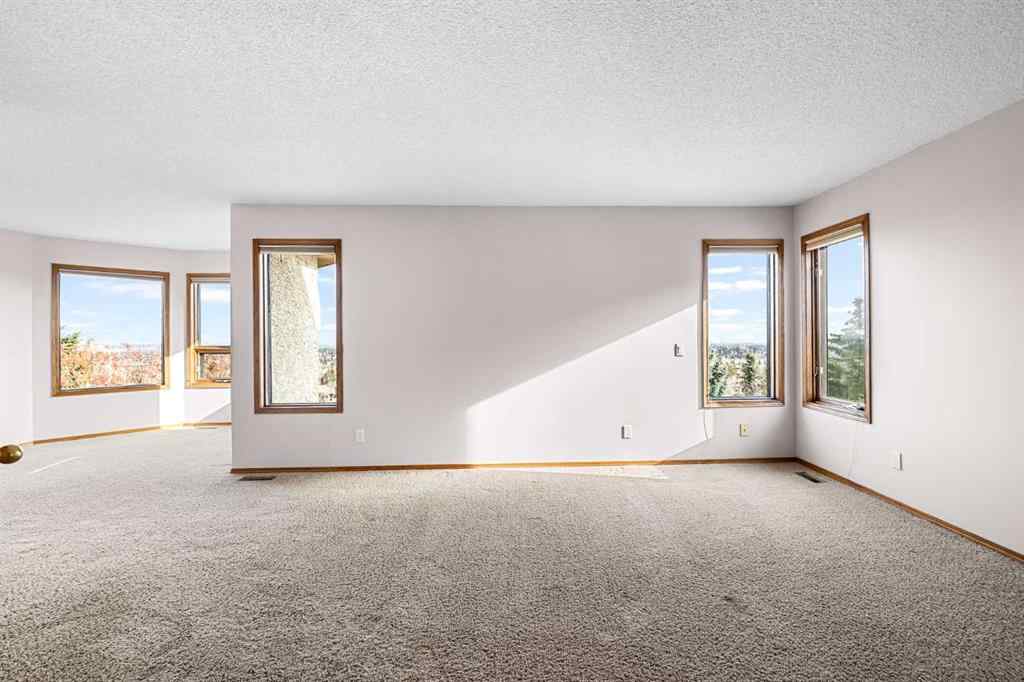 MLS® A2268510 - 201 Signature Way SW in Signal Hill Calgary, Residential