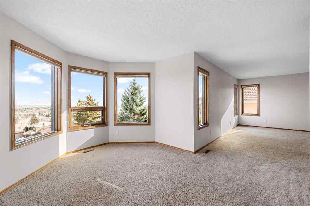 MLS® A2268510 - 201 Signature Way SW in Signal Hill Calgary, Residential