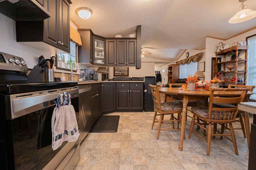 MLS® A2268517 - 8810 89 Avenue  in Creekside Grande Prairie, Residential