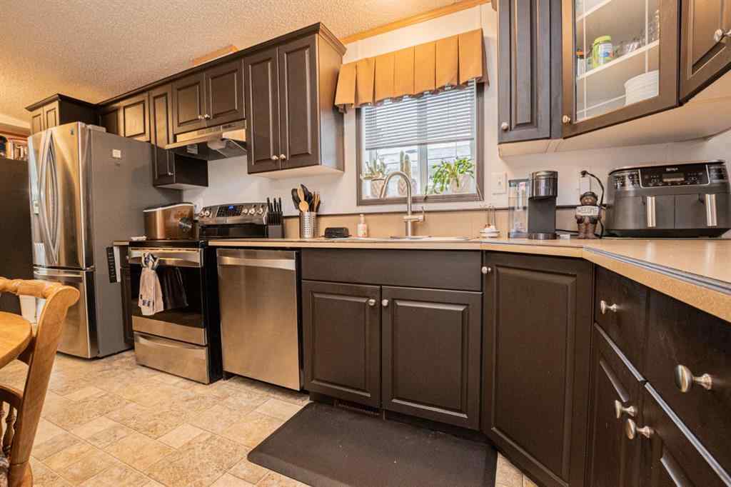MLS® A2268517 - 8810 89 Avenue  in Creekside Grande Prairie, Residential