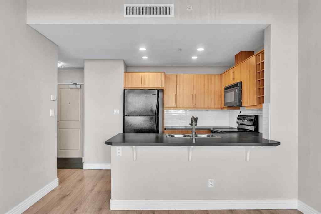 MLS® A2268550 - Unit #1205 55 Spruce Place SW in Spruce Cliff Calgary, Residential