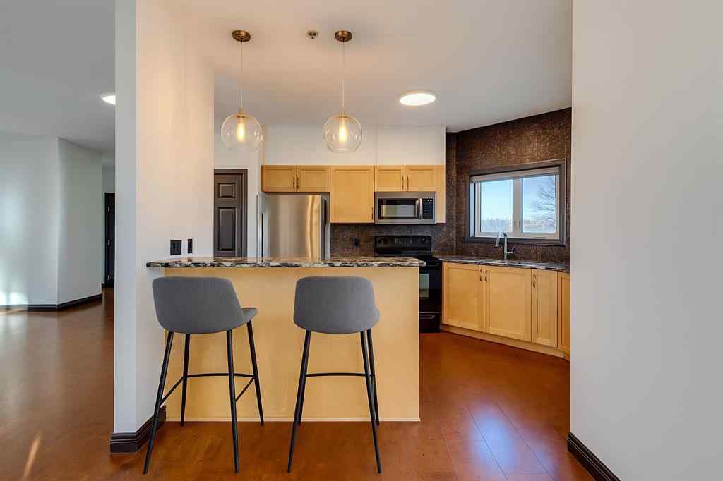 MLS® A2268563 - Unit #403 3810 43 Street SW in Glenbrook Calgary, Residential