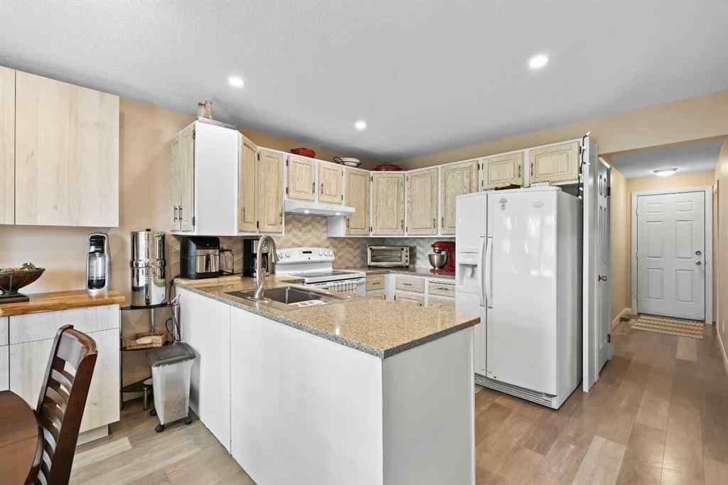 MLS® A2268576 - 100 Hawkfield Crescent NW in Hawkwood Calgary, Residential