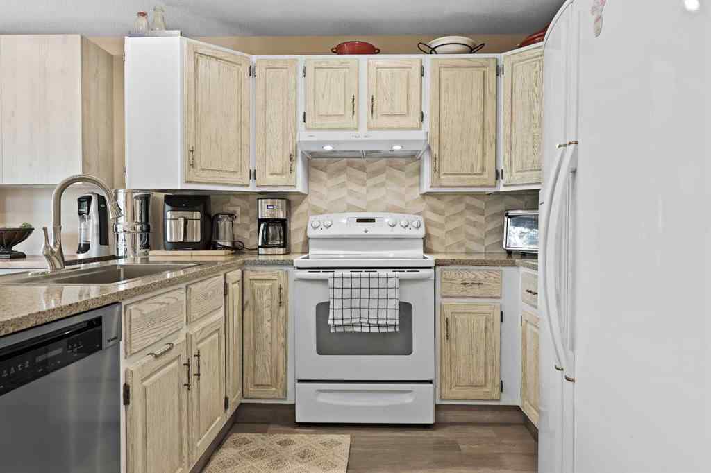 MLS® A2268576 - 100 Hawkfield Crescent NW in Hawkwood Calgary, Residential