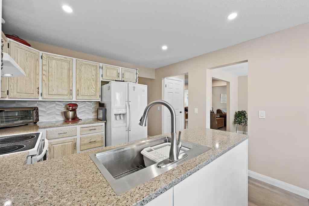 MLS® A2268576 - 100 Hawkfield Crescent NW in Hawkwood Calgary, Residential