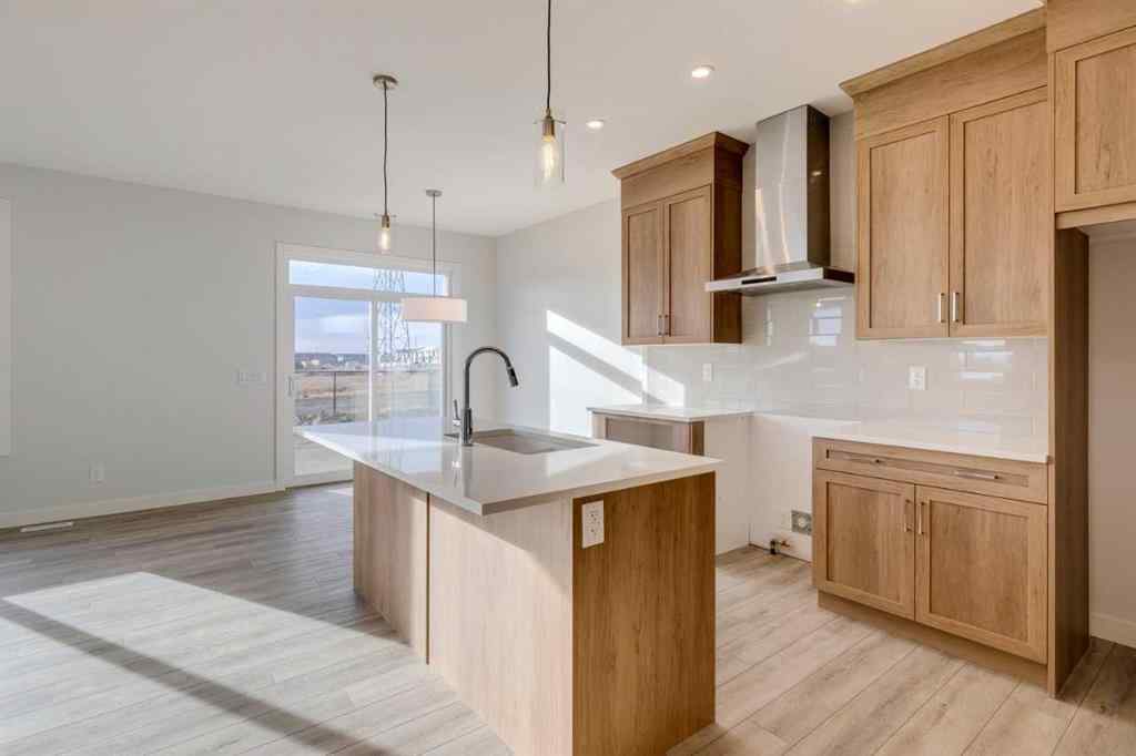 MLS&reg; # A2268612 - 303 Dawson Dock Way  in Dawson\'s Landing Chestermere, Residential Open Houses