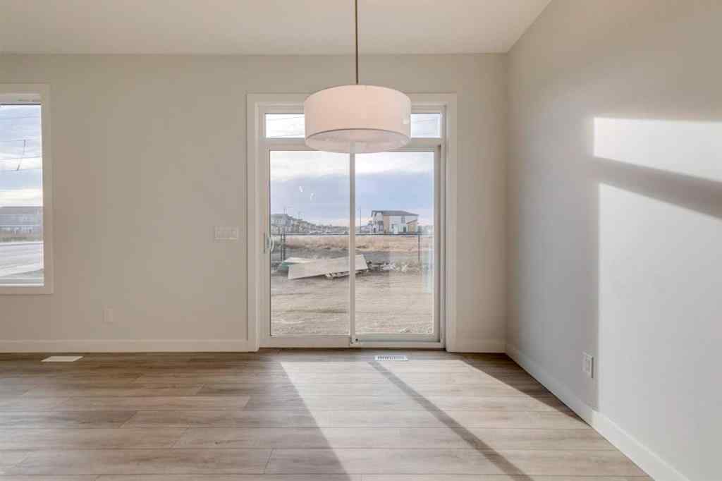 MLS&reg; # A2268612 - 303 Dawson Dock Way  in Dawson\'s Landing Chestermere, Residential Open Houses