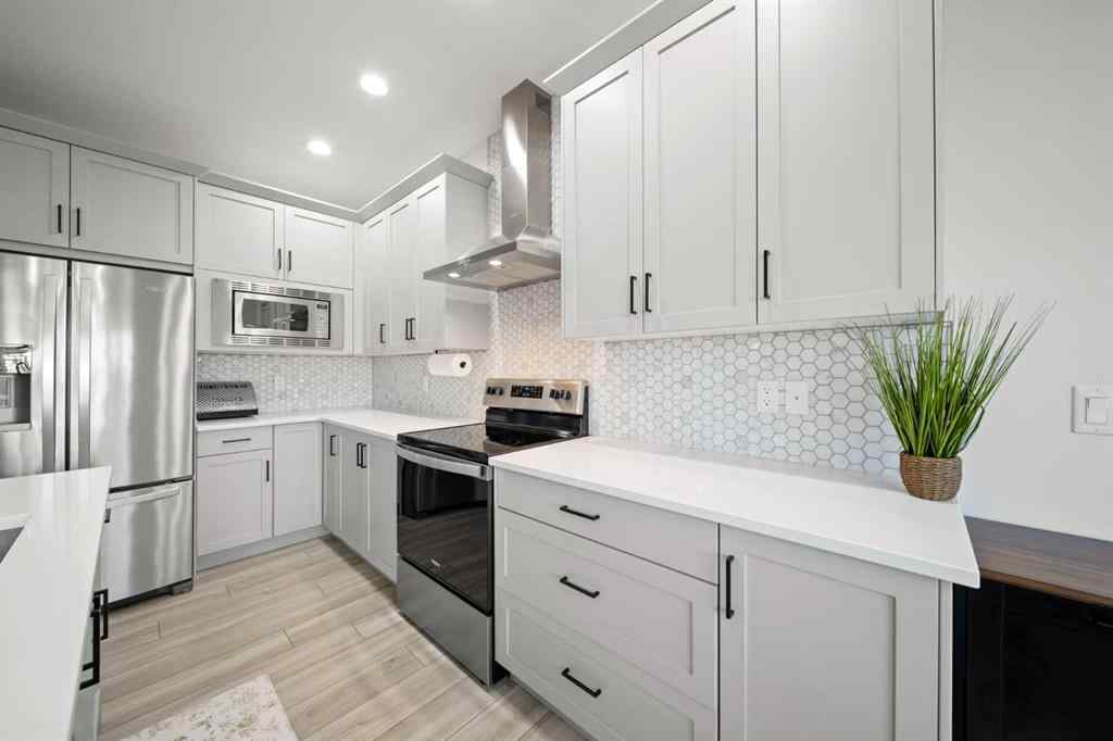 MLS® A2268701 - 50 Bayview Circle SW in Bayview Airdrie, Residential