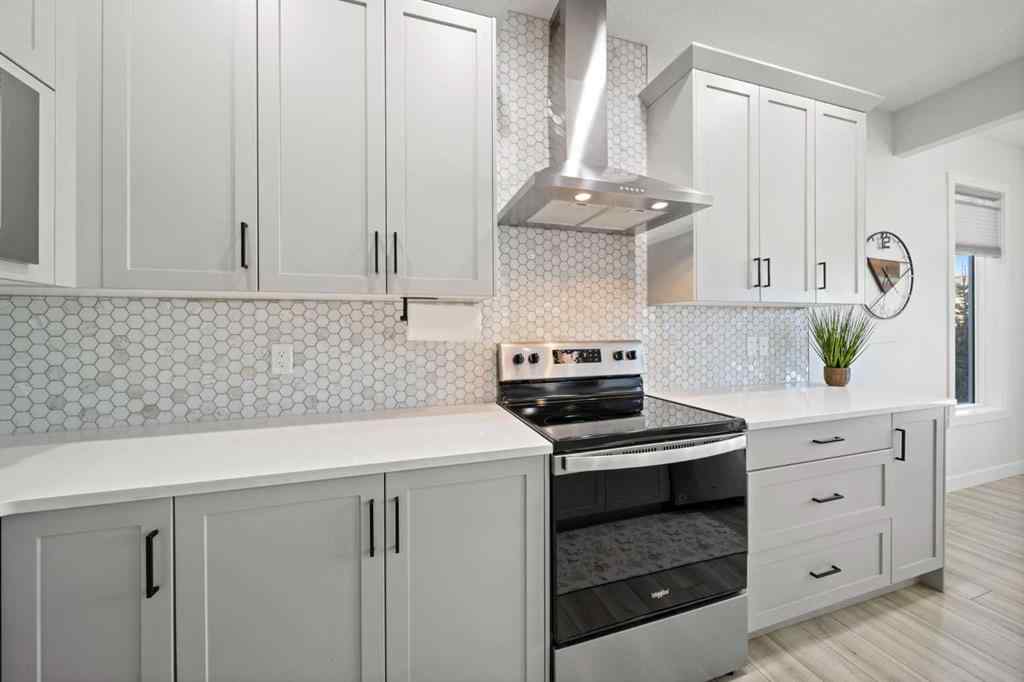 MLS® A2268701 - 50 Bayview Circle SW in Bayview Airdrie, Residential