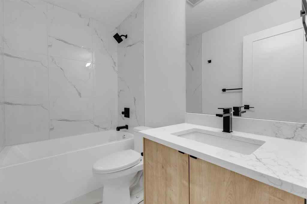 MLS® A2268732 - 4138 7 Avenue SW in Rosscarrock Calgary, Residential