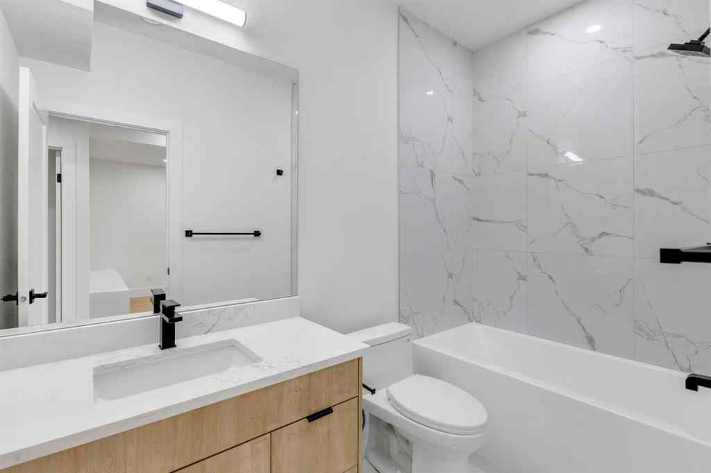 MLS® A2268732 - 4138 7 Avenue SW in Rosscarrock Calgary, Residential