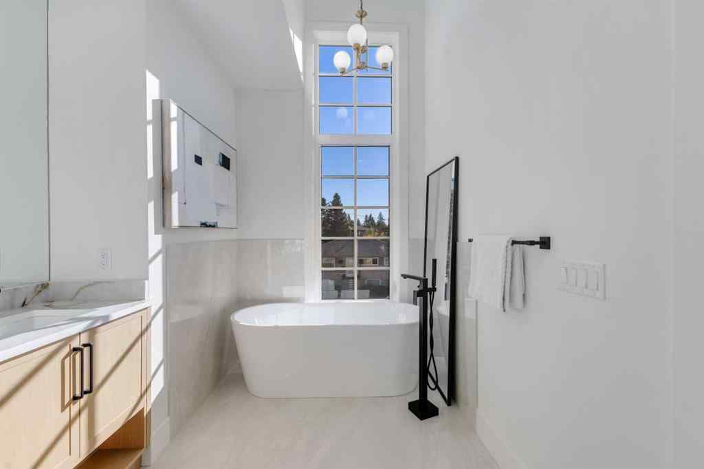 MLS® A2268732 - 4138 7 Avenue SW in Rosscarrock Calgary, Residential