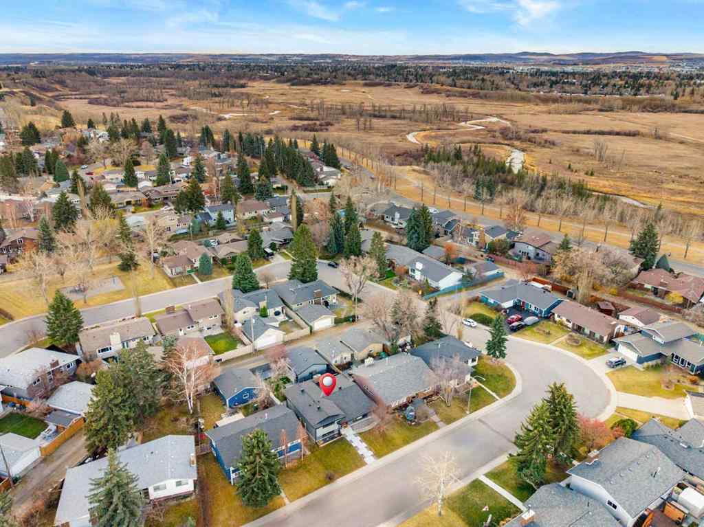 MLS® A2268750 - 348 Parkwood Close SE in Parkland Calgary, Residential