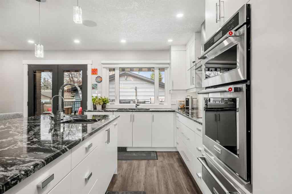 MLS® A2268750 - 348 Parkwood Close SE in Parkland Calgary, Residential