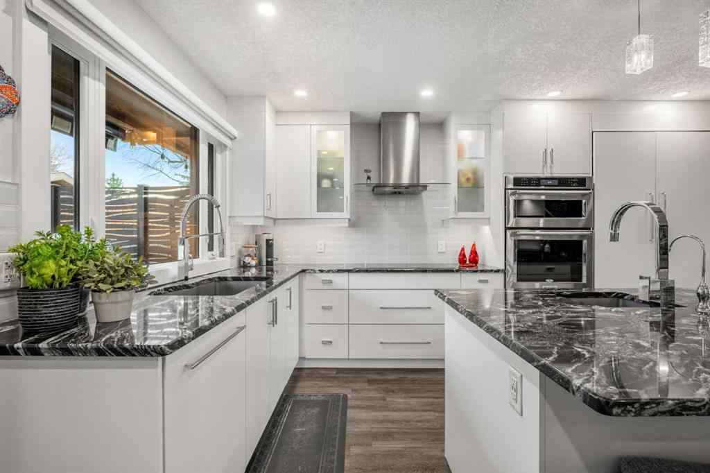 MLS® A2268750 - 348 Parkwood Close SE in Parkland Calgary, Residential