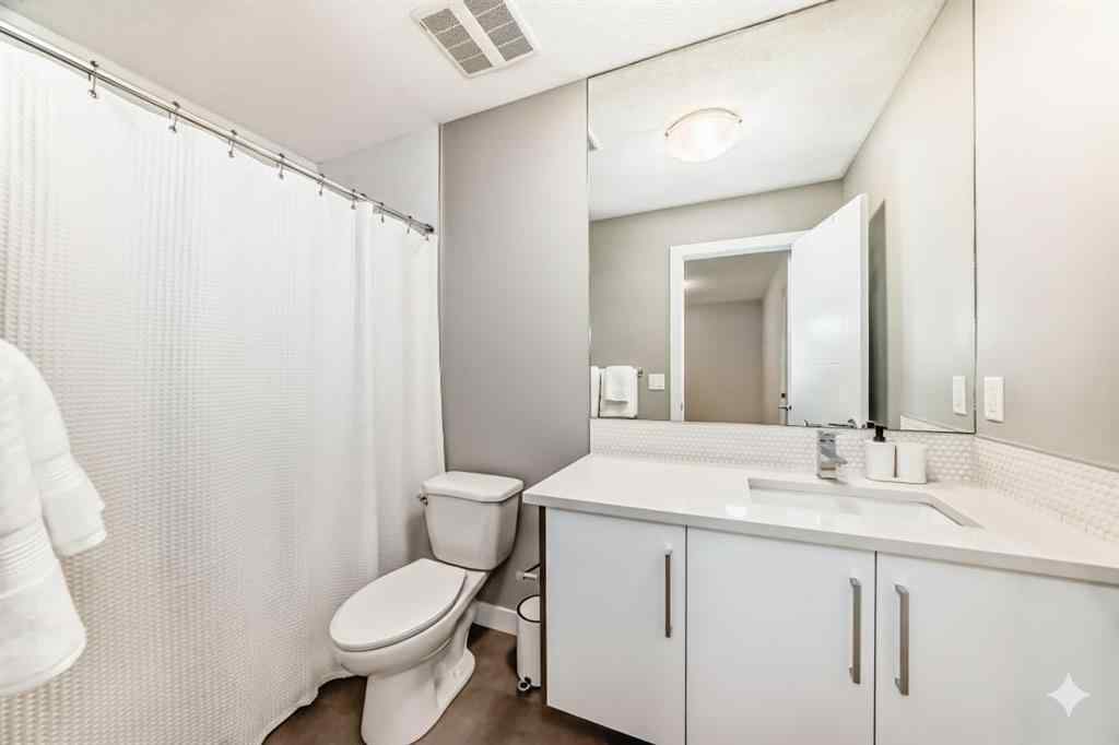 MLS® A2268770 - Unit #1 134 22 Avenue NE in Tuxedo Park Calgary, Residential