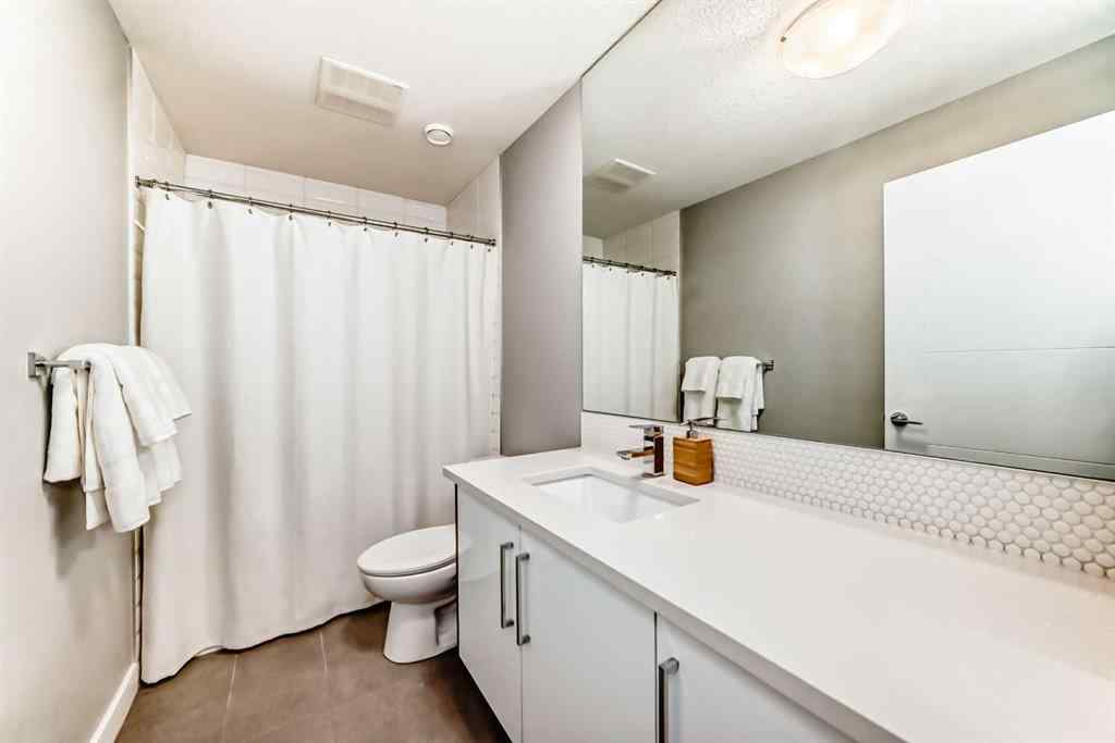 MLS® A2268770 - Unit #1 134 22 Avenue NE in Tuxedo Park Calgary, Residential