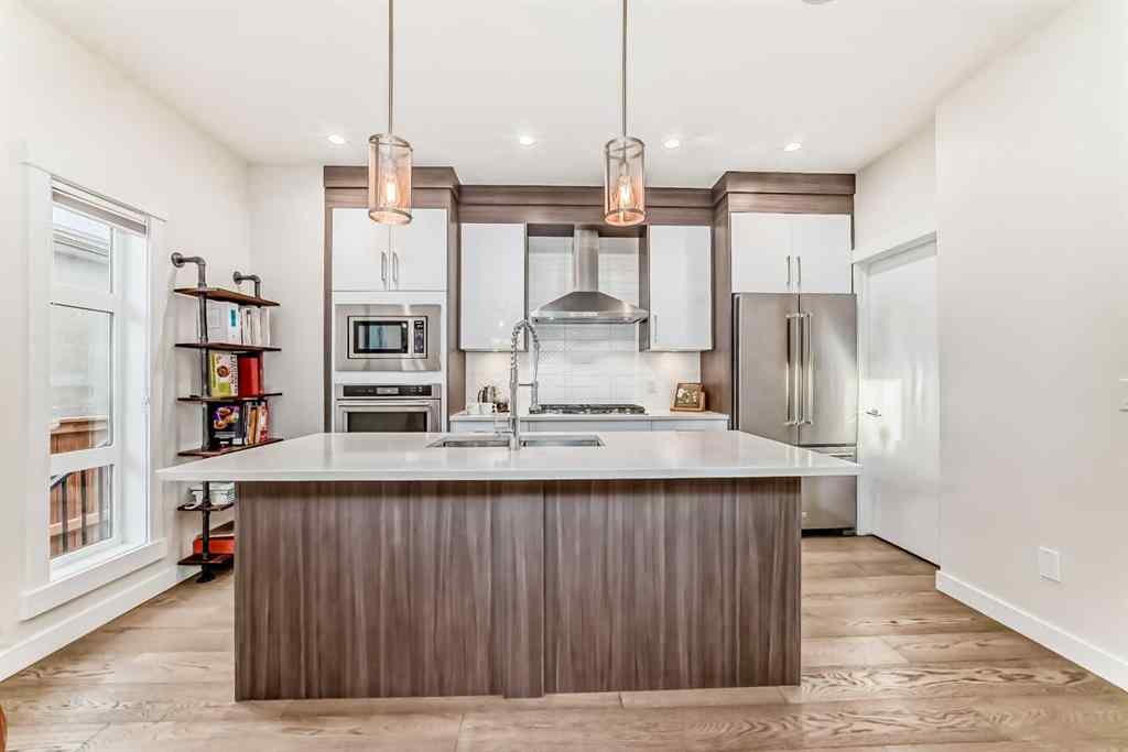 MLS® A2268770 - Unit #1 134 22 Avenue NE in Tuxedo Park Calgary, Residential