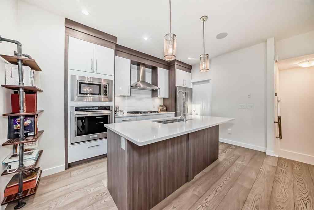 MLS® A2268770 - Unit #1 134 22 Avenue NE in Tuxedo Park Calgary, Residential