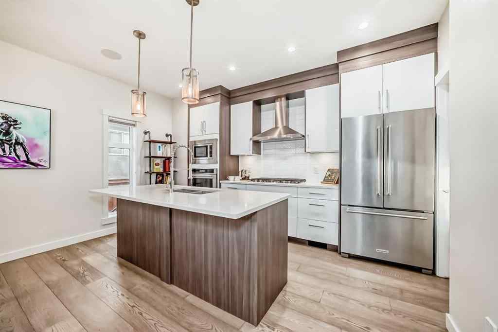 MLS® A2268770 - Unit #1 134 22 Avenue NE in Tuxedo Park Calgary, Residential