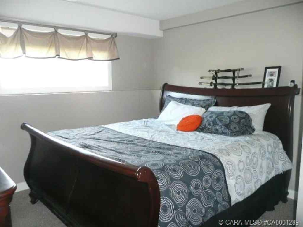 MLS® A2268778 - 6207 59 Street  in Lucas Heights Ponoka, Residential