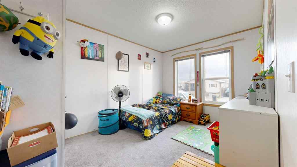 MLS® A2268779 - 8810 90 Street  in Creekside Grande Prairie, Residential