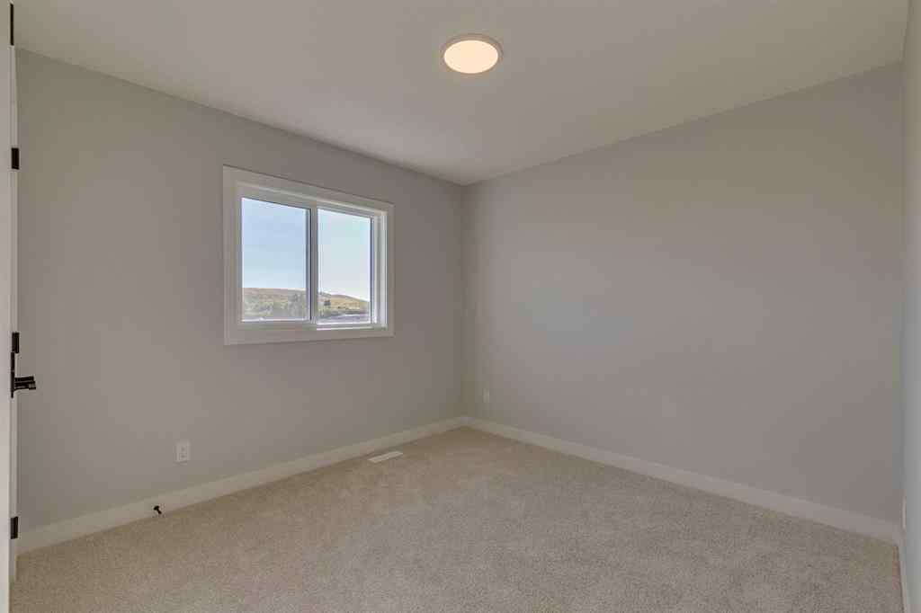 MLS® A2268809 - 143 Creekstone Green SW in Pine Creek Calgary, Residential