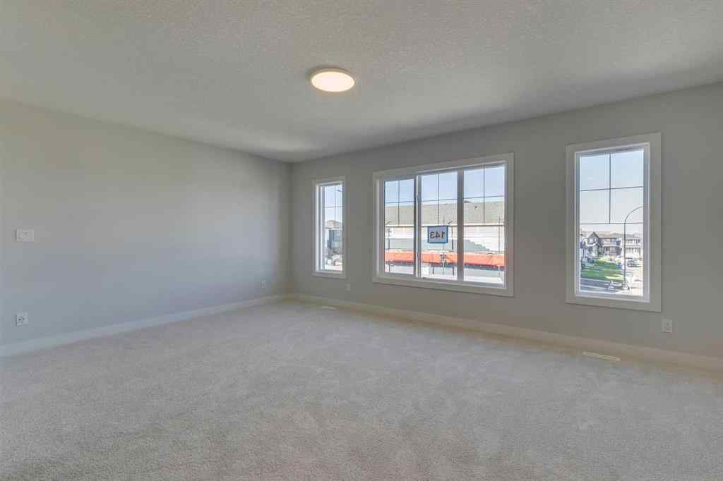 MLS® A2268809 - 143 Creekstone Green SW in Pine Creek Calgary, Residential