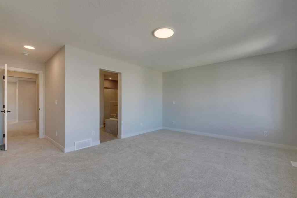 MLS® A2268809 - 143 Creekstone Green SW in Pine Creek Calgary, Residential