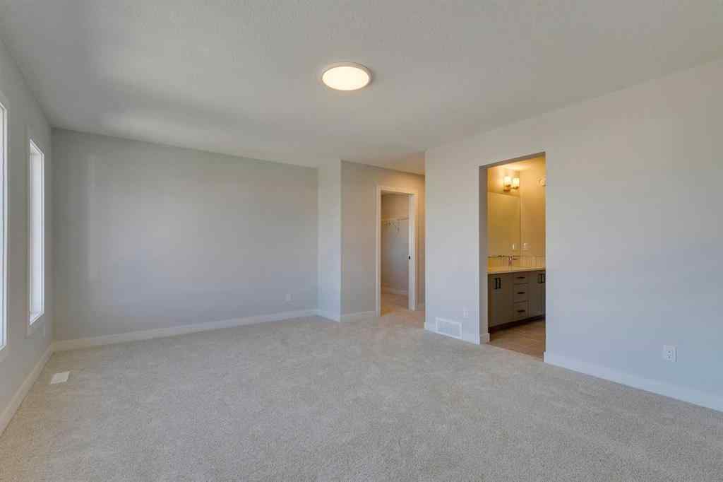 MLS® A2268809 - 143 Creekstone Green SW in Pine Creek Calgary, Residential