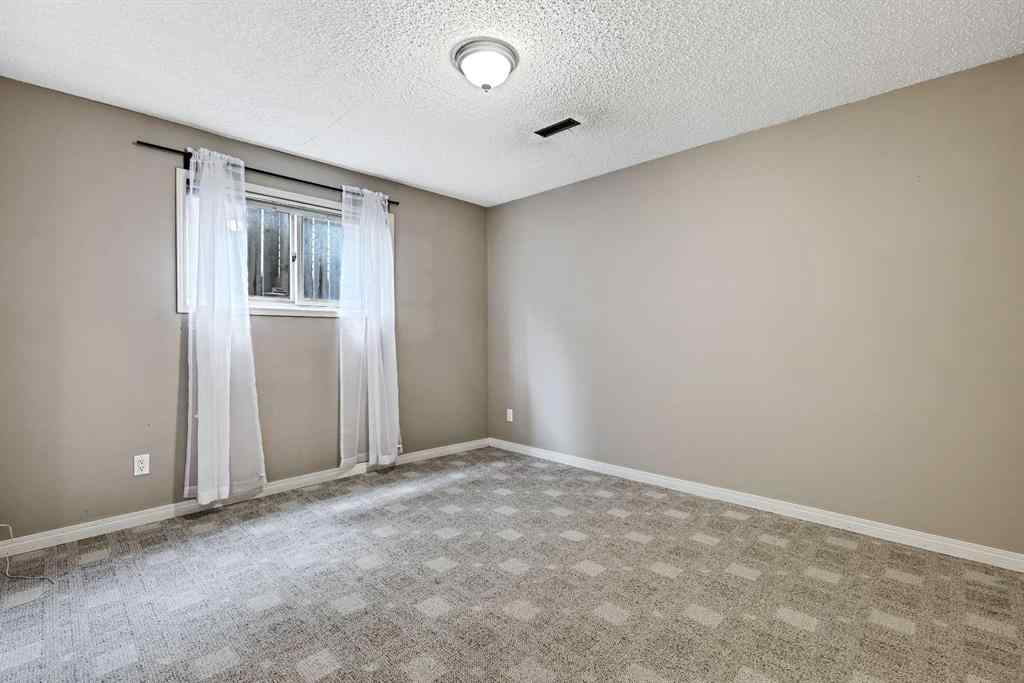 MLS® A2268816 - 128 Ventura Way NE in Vista Heights Calgary, Residential