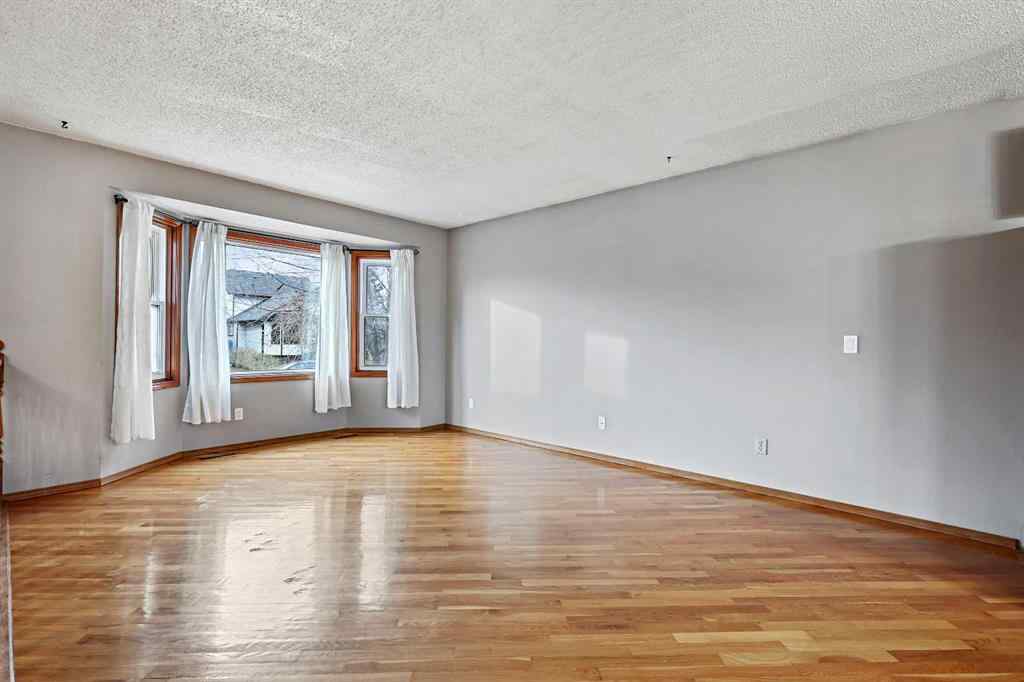 MLS® A2268816 - 128 Ventura Way NE in Vista Heights Calgary, Residential