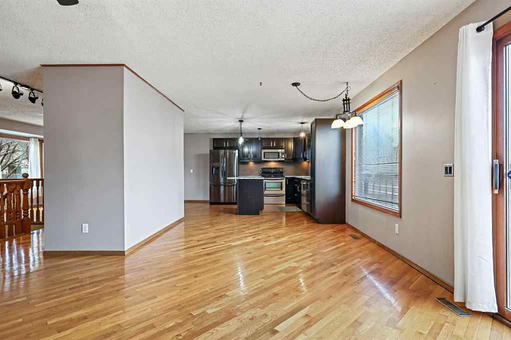 MLS® A2268816 - 128 Ventura Way NE in Vista Heights Calgary, Residential