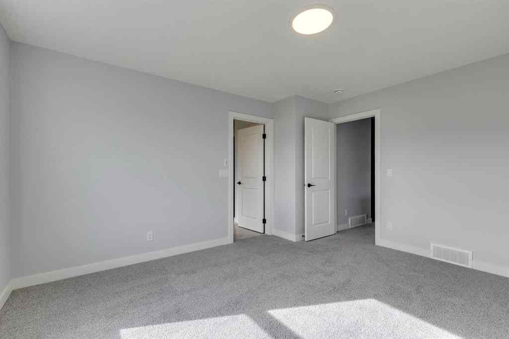 MLS® A2268823 - 31 Creekstone Green SW in Pine Creek Calgary, Residential